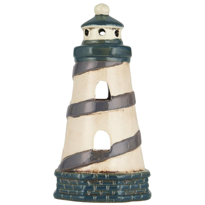 Maritime lighthouse tea light house in Scandinavian style. Model LOKKEN LYNGVIG. Lighthouse design, suitable for all tea lights. Ceramic with fired colors, white blue, size 19 x 9 x 9 cm.
